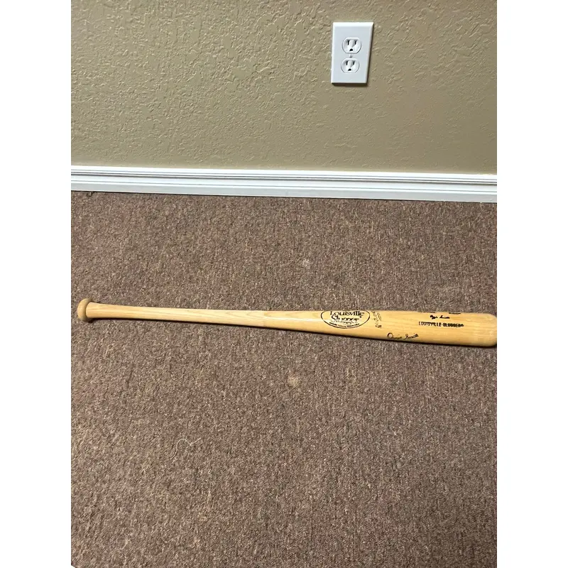 Signed Ozzie Smith Louisville Slugger