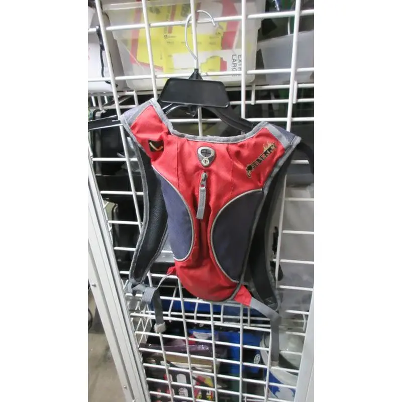Used Ledge Gooseberry Hydration Pack- wear