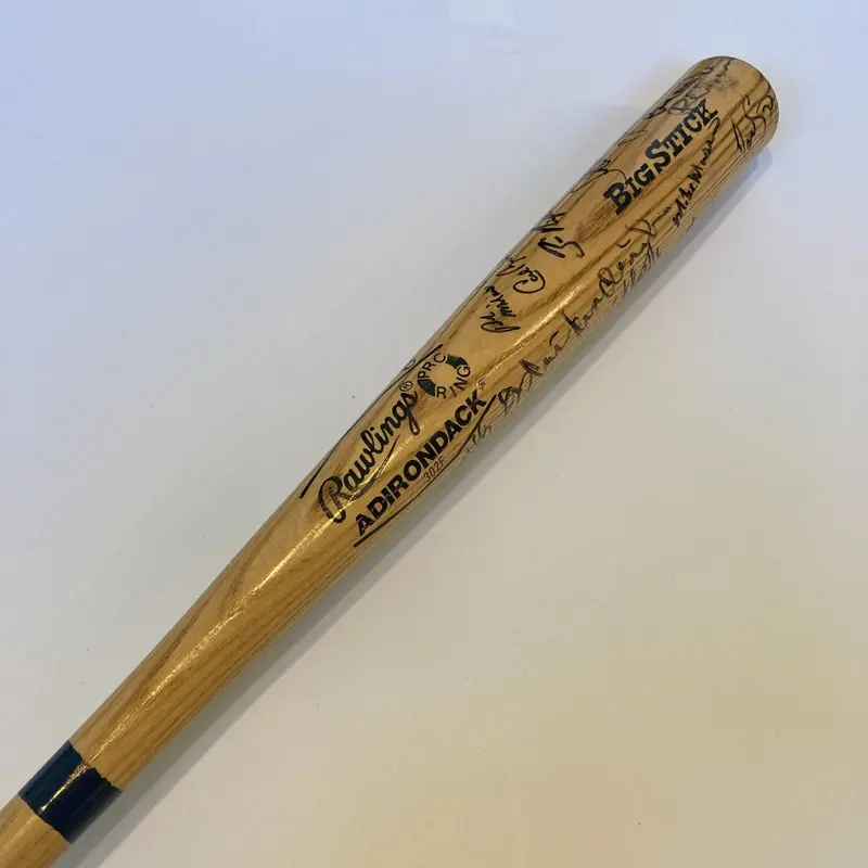 1987 Baltimore Orioles Team Signed Baseball Bat Cal Ripken Jr. & Cal Sr.